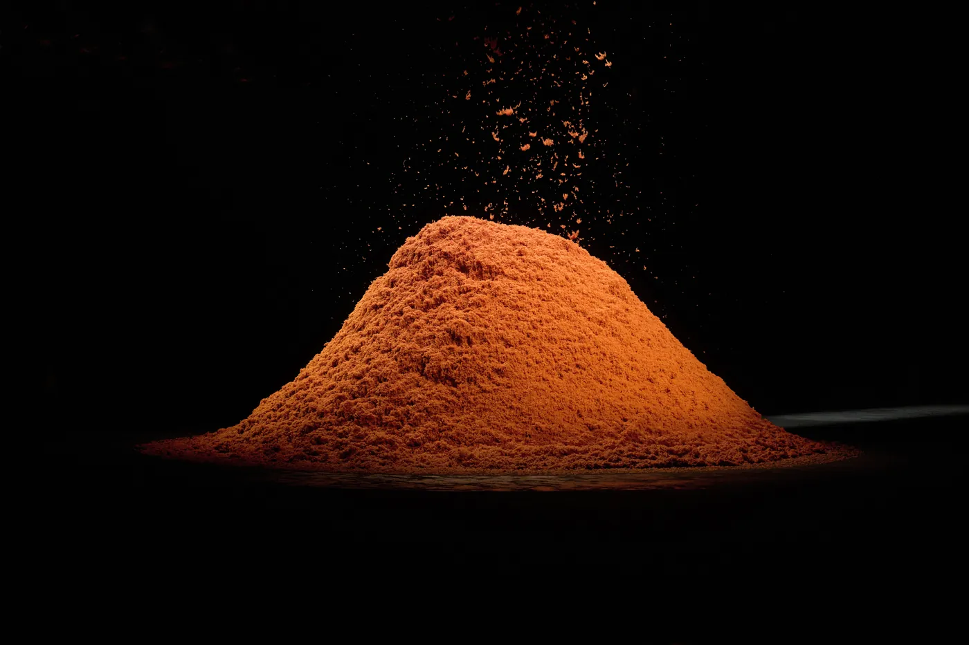 A mound of raw Oasi Cashmere fibre lit on the ZEGNA FW24 set